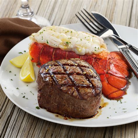 Steak and lobster - Learn how to cook a tender filet mignon and a sweet lobster tail in less than 30 minutes with this easy surf and turf recipe. Serve with garlic butter sauce and you…
